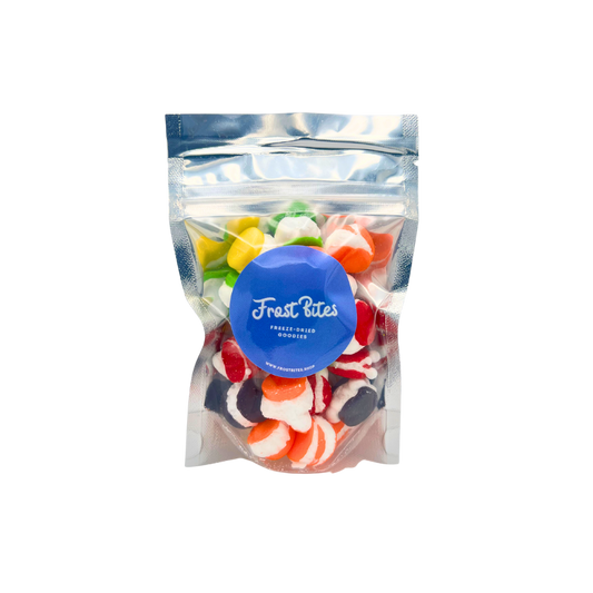 A bag of The Fizzy Frenzy freeze-dried candy in a clear plastic bag by Frost Bites - Freeze Dried Goodies.