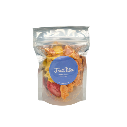 A bag of The Tropical Fruit Bites snacks by Frost Bites - Freeze Dried Goodies in a plastic bag.
