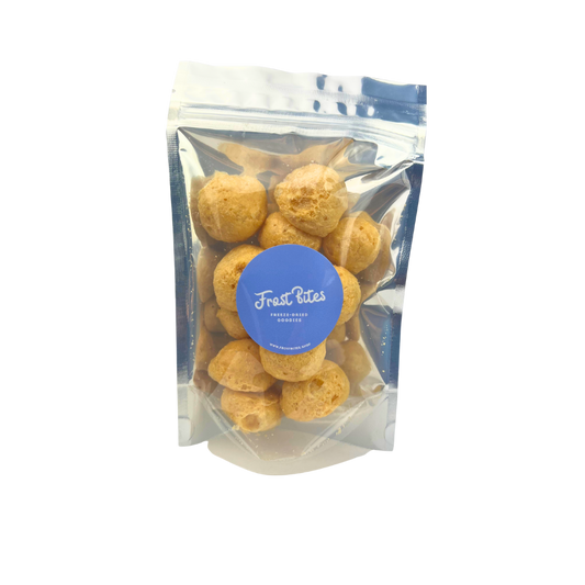 A creamy bag of The Worth It freeze-dried peanut butter balls on a white background from Frost Bites - Freeze Dried Goodies.